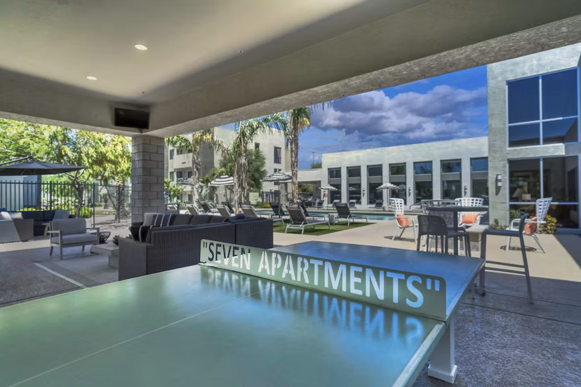 Tranquil courtyard with lush gardens at Seven Apartments, offering a serene retreat in the heart of the city