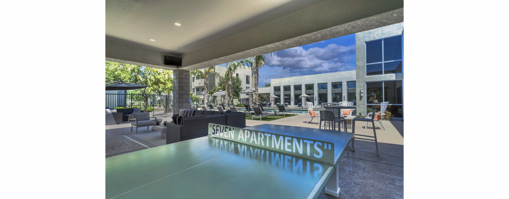 Tranquil courtyard with lush gardens at Seven Apartments, offering a serene retreat in the heart of the city