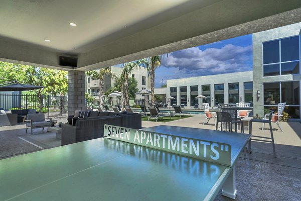 Tranquil courtyard with lush gardens at Seven Apartments, offering a serene retreat in the heart of the city
