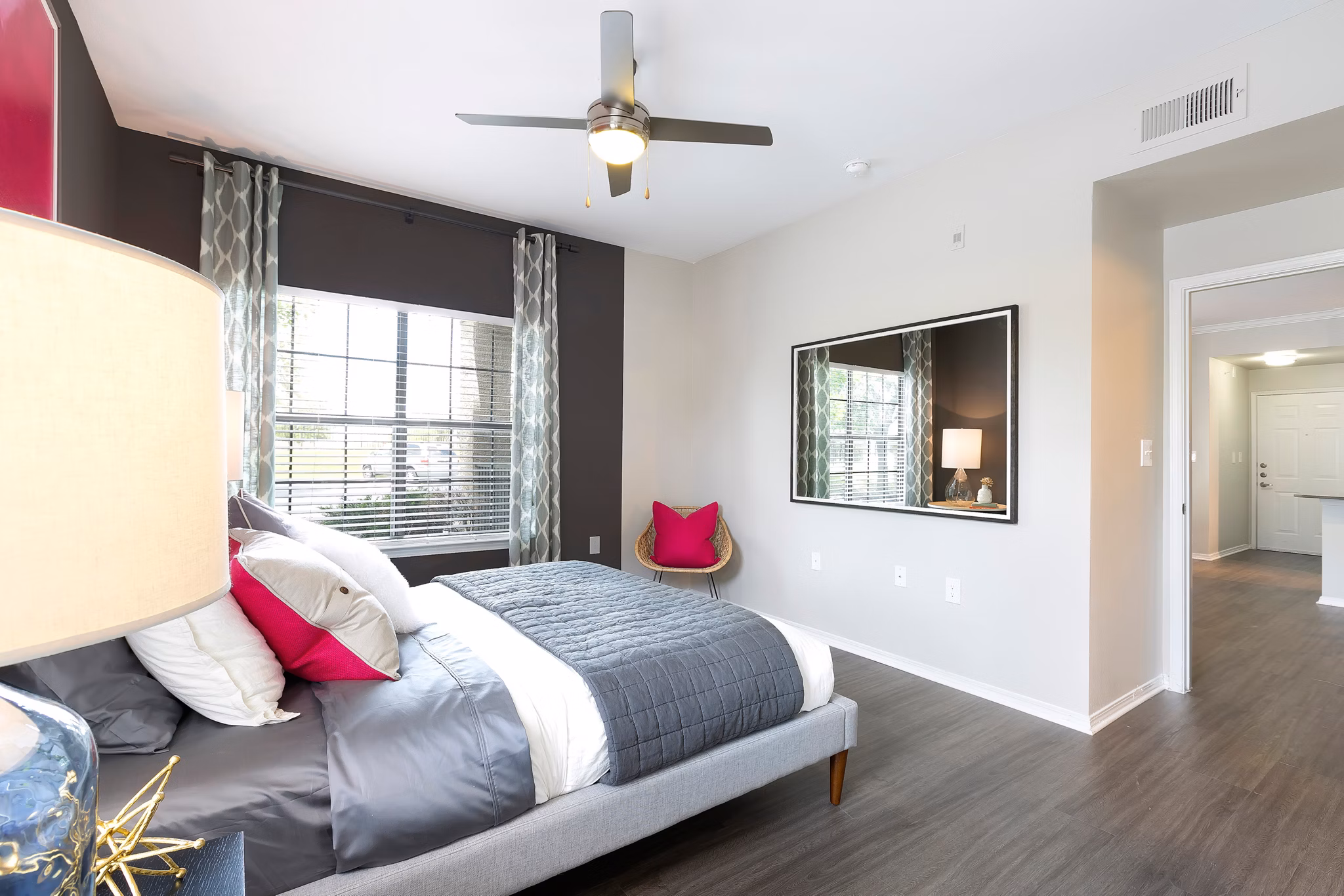 Bedroom featuring contemporary design and plush bedding at Folio Apartments, a luxury living space by Greystar