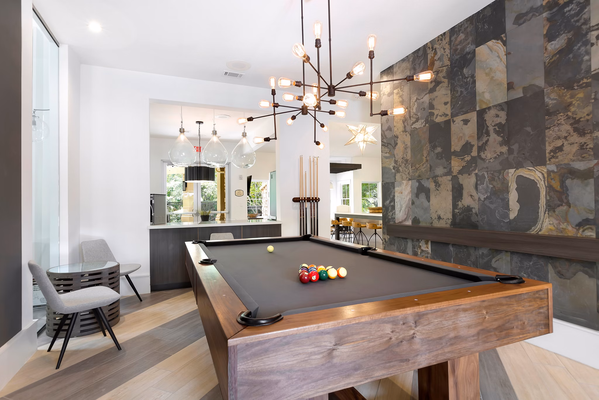 Clubhouse offering contemporary design with modern furnishings at Folio Apartments, Greystar luxury living community in vibrant urban setting