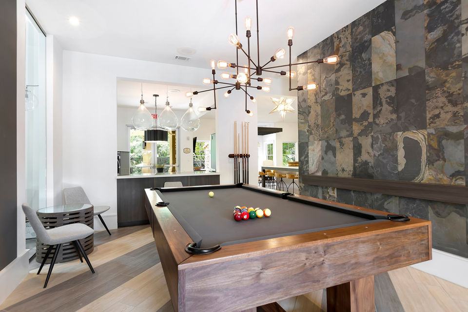 Clubhouse offering contemporary design with modern furnishings at Folio Apartments, Greystar luxury living community in vibrant urban setting