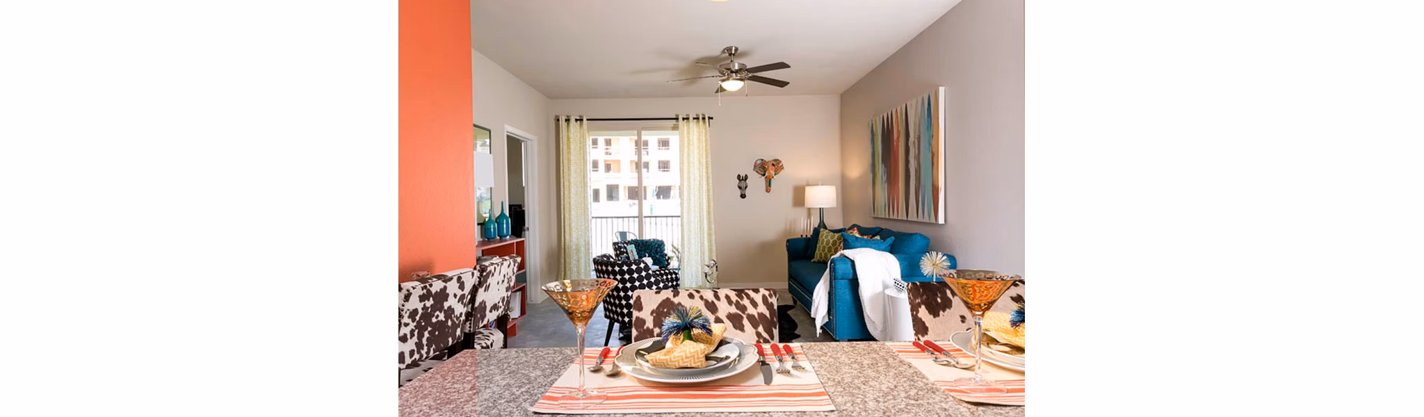 Spacious living room with modern decor at HiLine at Littleton Commons Apartments