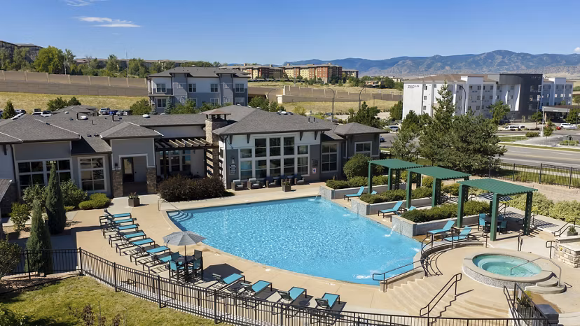 Resort-style swimming pool at HiLine at Littleton Commons Apartments