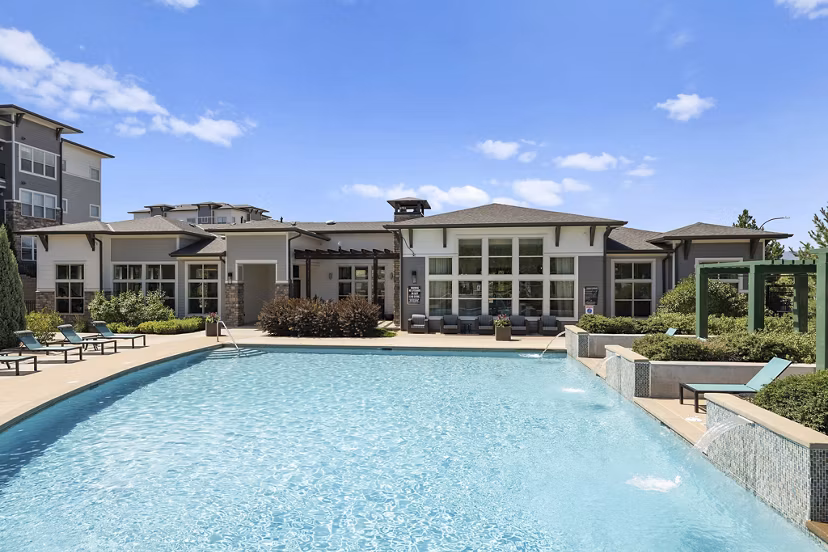 Infinity pool with mountain views at HiLine at Littleton Commons Apartments