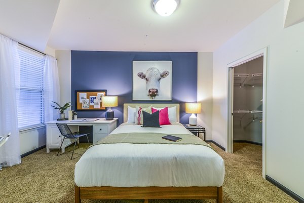 Cozy bedroom with modern decor at Avana Westside Apartments