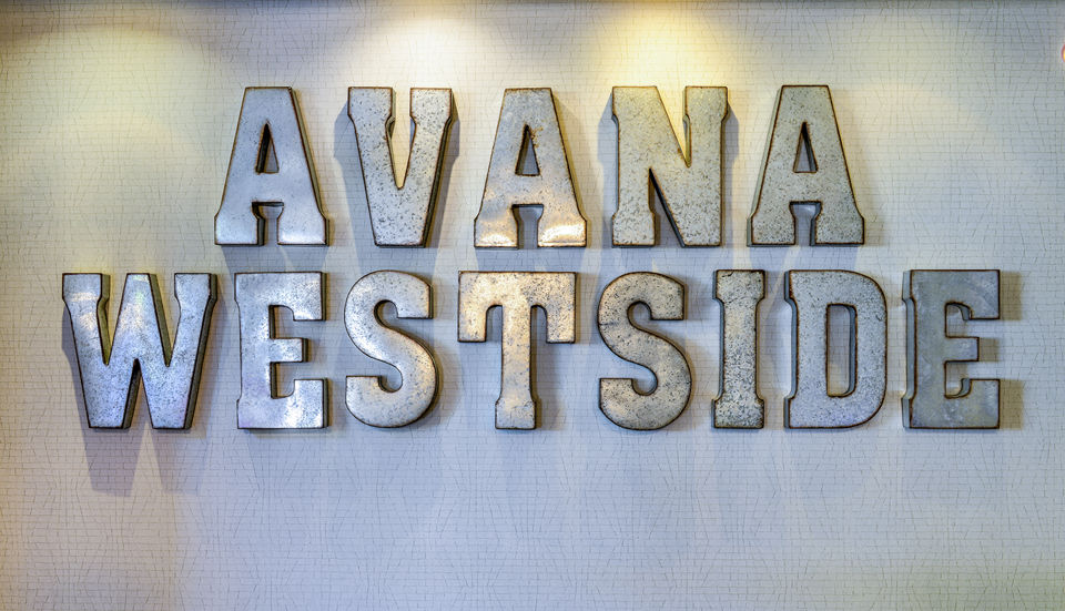 Modern clubhouse with stylish seating and sleek design at Avana Westside Apartments