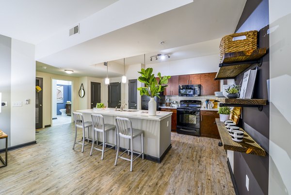 Dining area with modern furnishings at Avana Westside Apartments, a luxury community by Greystar