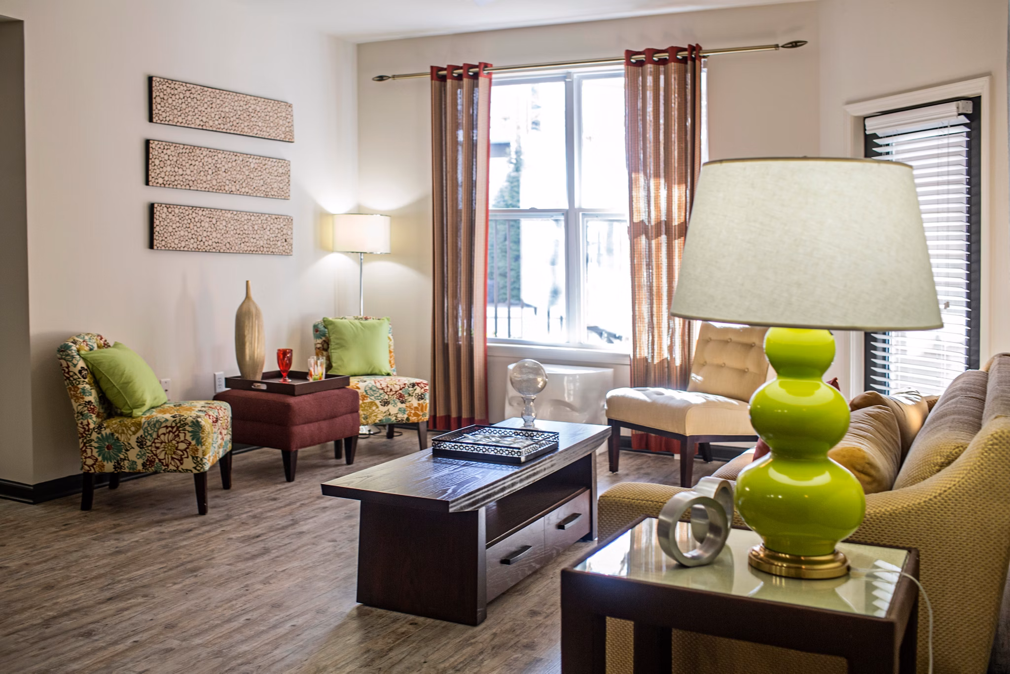 Spacious living room with modern furnishings at Avana Westside Apartments