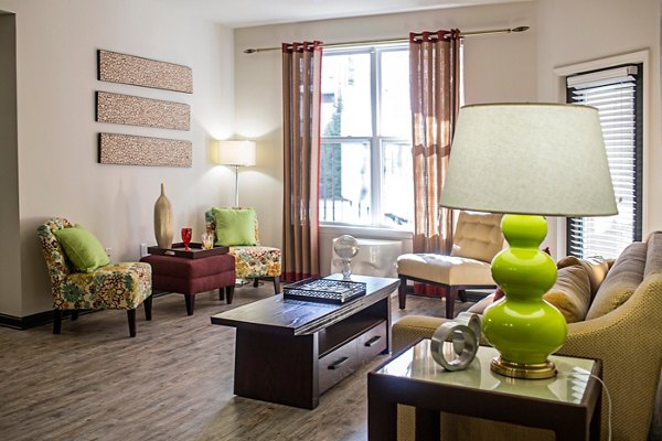 Spacious living room with modern furnishings at Avana Westside Apartments