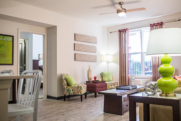 Spacious living room with modern furnishings at Avana Westside Apartments