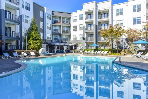 Relaxing poolside view at Avana Westside Apartments, a luxurious community with premium amenities in a vibrant urban setting