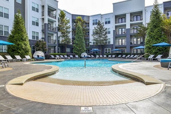 Resort-style pool with sundeck at Avana Westside Apartments