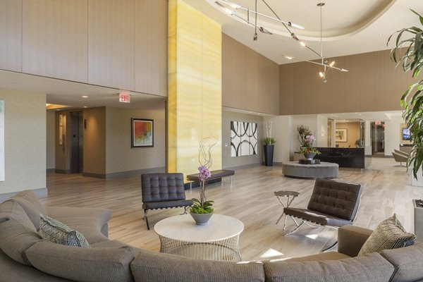 Elegant clubhouse featuring modern decor and cozy seating at One Lakes Edge luxury apartments