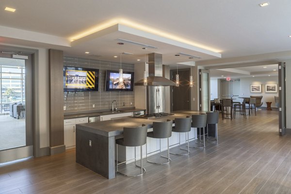 Modern clubhouse with plush seating and vibrant decor at One Lakes Edge luxury apartments