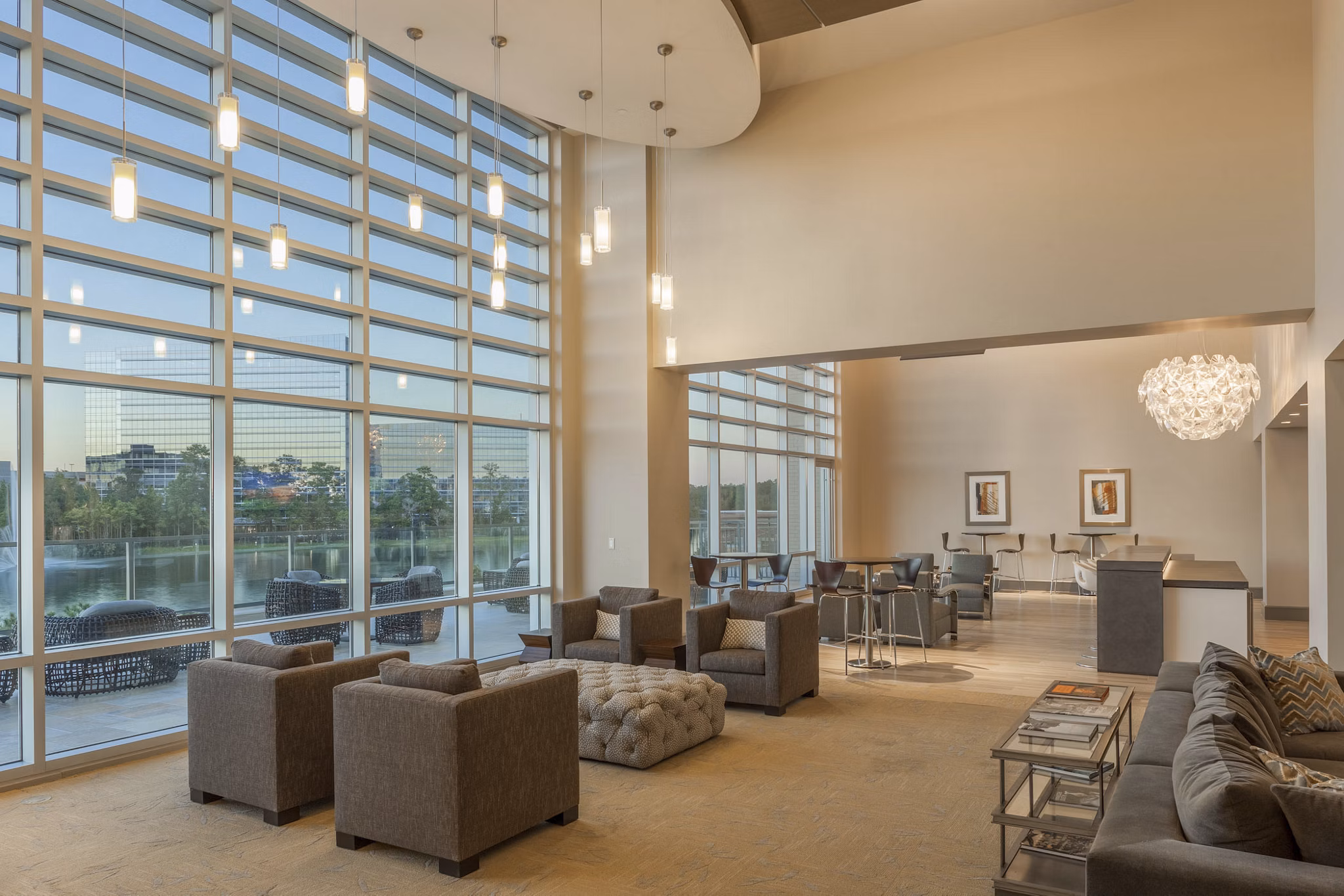 Clubhouse lounge with modern decor and cozy seating at One Lakes Edge luxury apartments