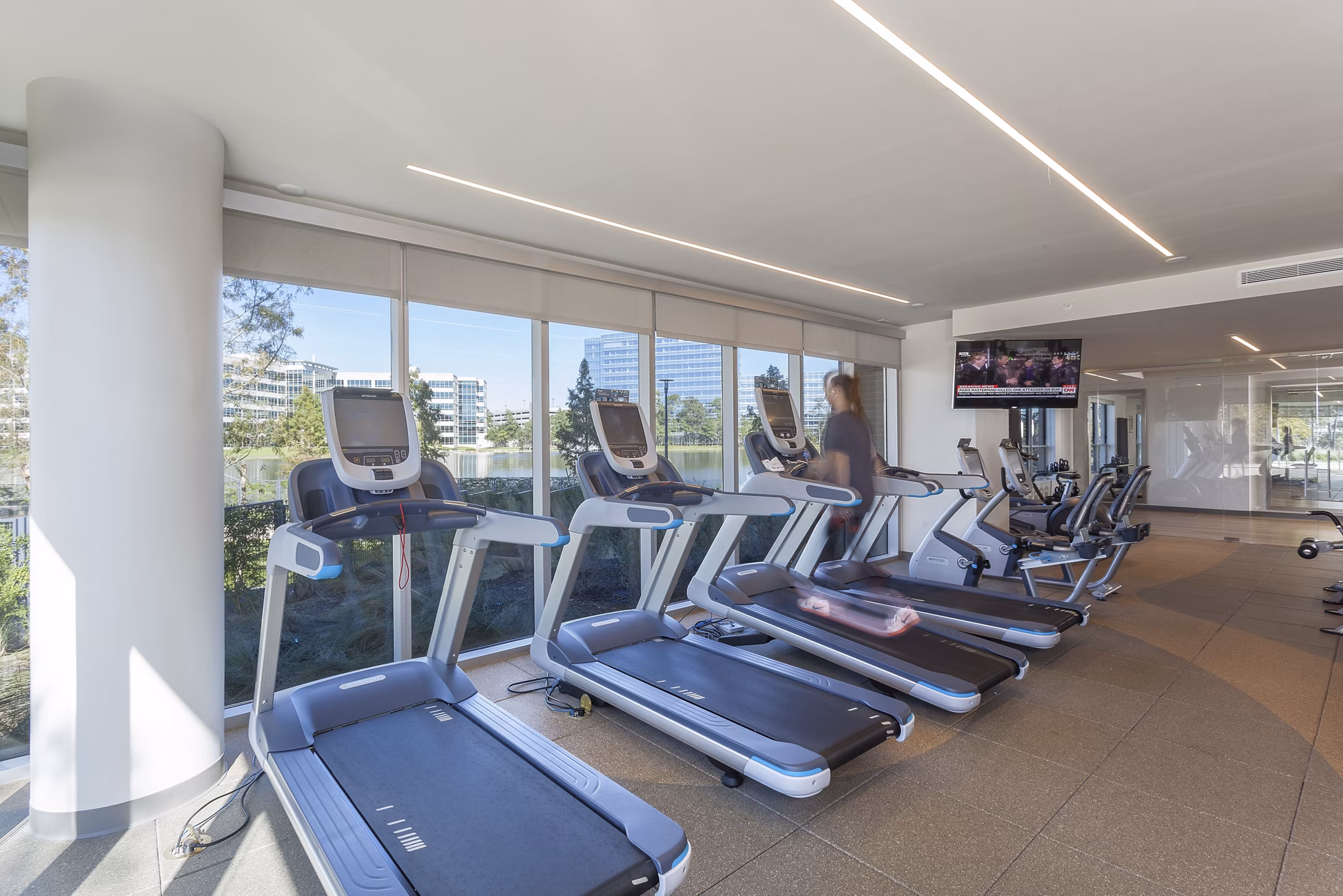State-of-the-art fitness center with modern equipment at One Lakes Edge apartments