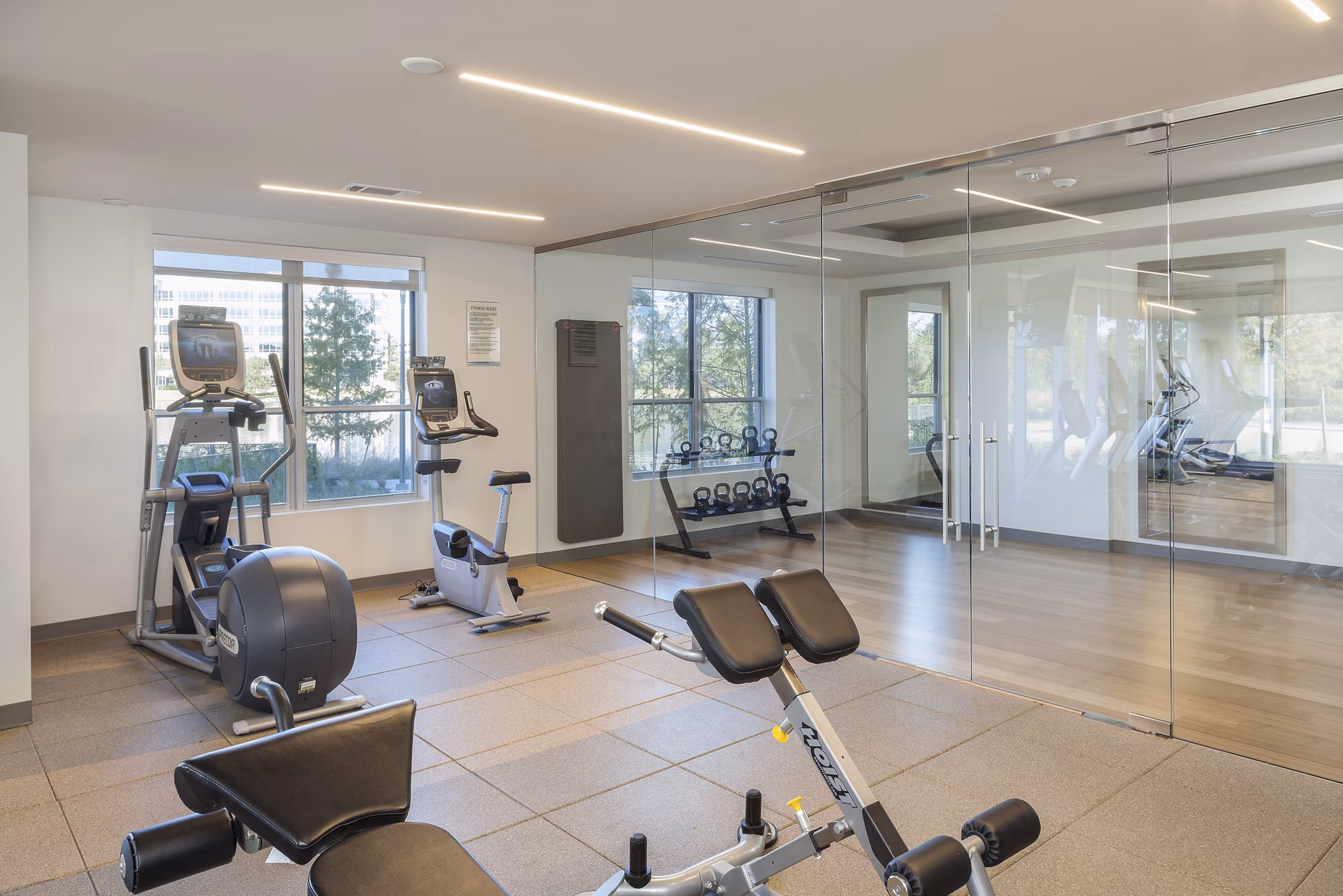 State-of-the-art fitness center with modern equipment at One Lakes Edge apartments