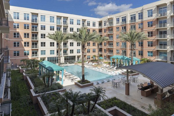 Scenic lakefront pool at One Lakes Edge apartments