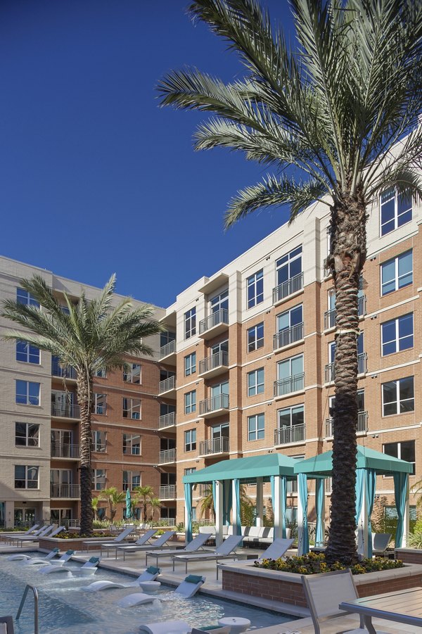 Chic poolside vibe at One Lakes Edge, luxury apartments with serene water views in The Woodlands