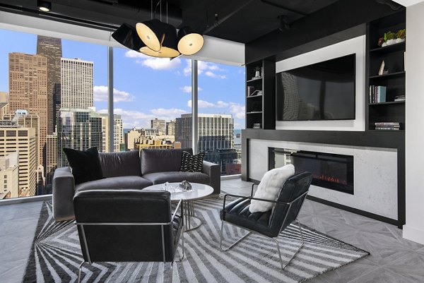 Aston Apartments: Elegant clubhouse featuring modern decor and seating areas, perfect for social gatherings and events