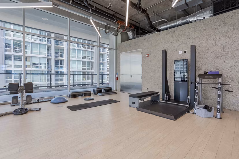 fitness center at Aston Apartments