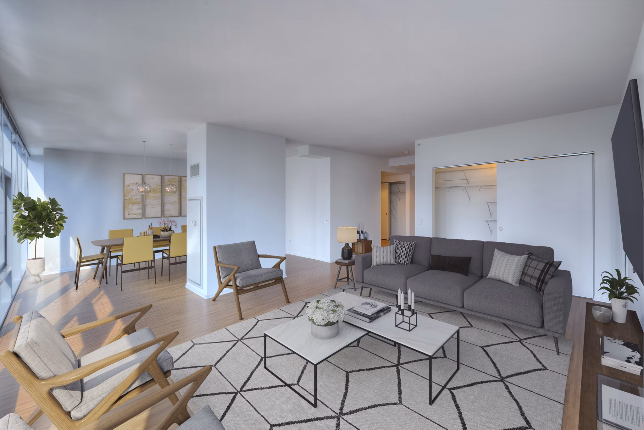 Spacious living room with modern decor and natural light in Aston Apartments, a Greystar luxury property