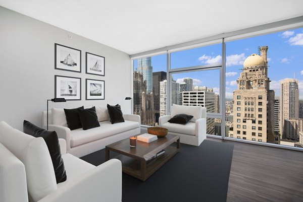 Elegant living room with modern decor in Aston Apartments Ideal for luxury urban living