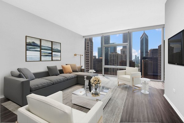 Spacious living room with modern design elements in Aston Apartments