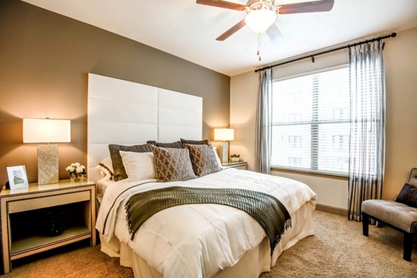 Luxurious bedroom with modern decor at Jones Grant Luxury Apartments