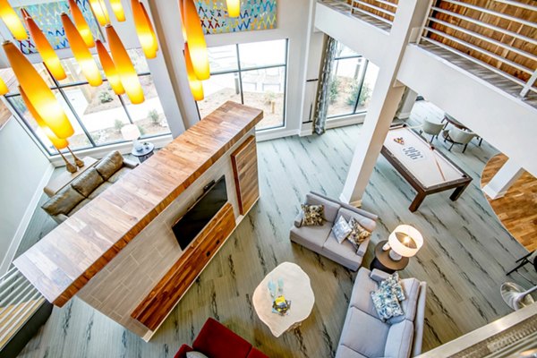 Clubhouse at Jones Grant: Stylish meeting space with modern decor in upscale luxury apartments