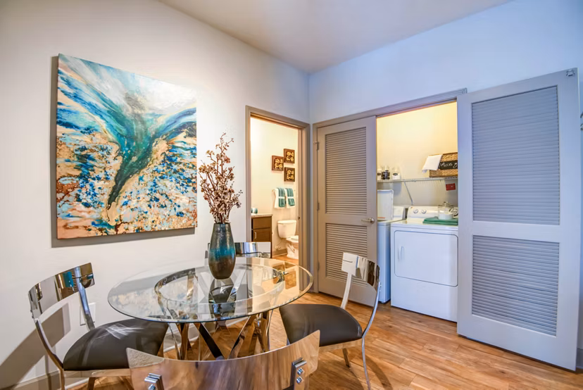 Elegant dining room with modern decor in Jones Grant Luxury Apartments