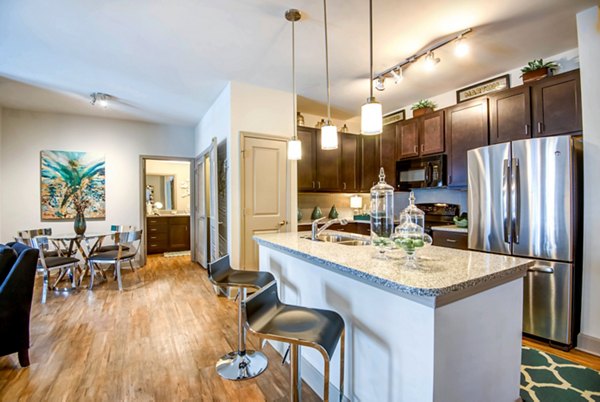 Modern kitchen with high-end appliances at Jones Grant Luxury Apartments