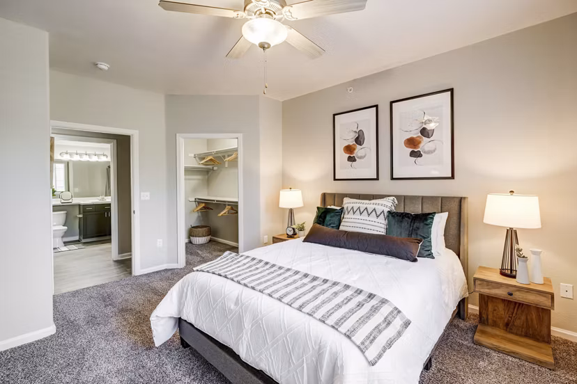 Elegant bedroom featuring contemporary design at Champions Apartments in luxury Greystar community