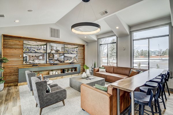 Elegant clubhouse with modern design at Champions Apartments featuring luxury amenities for residents