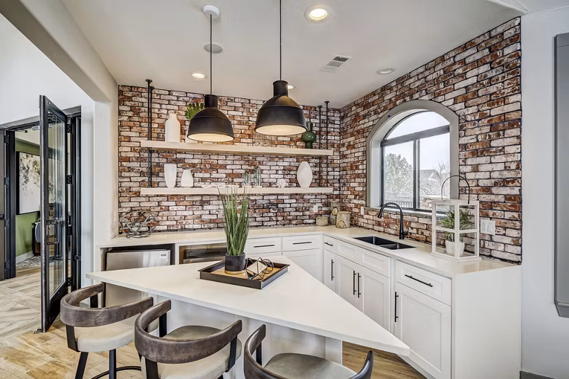 Modern clubhouse with stylish seating and decor at Champions Apartments