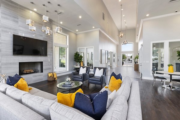 Clubhouse featuring modern design and communal spaces at Villages at Turtle Rock Apartments