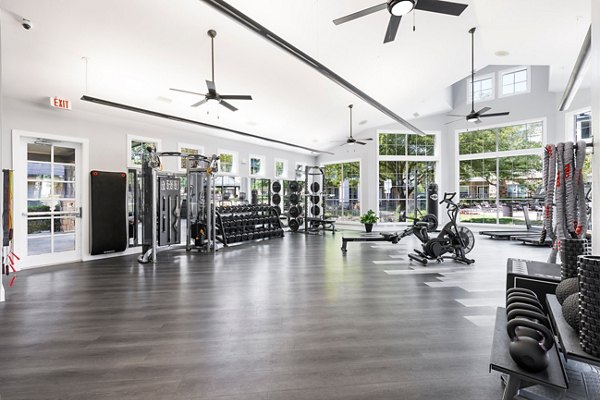 State-of-the-art fitness center at Villages at Turtle Rock Apartments, featuring latest gym equipment for residents' active lifestyle