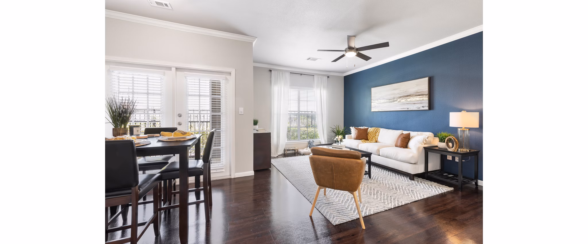 Spacious living room with modern decor at Villages at Turtle Rock Apartments