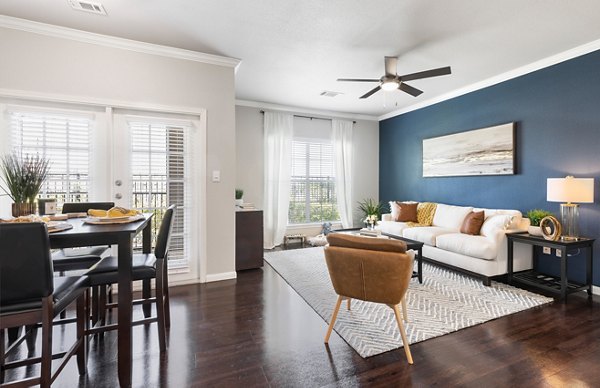 Spacious living room with modern decor at Villages at Turtle Rock Apartments