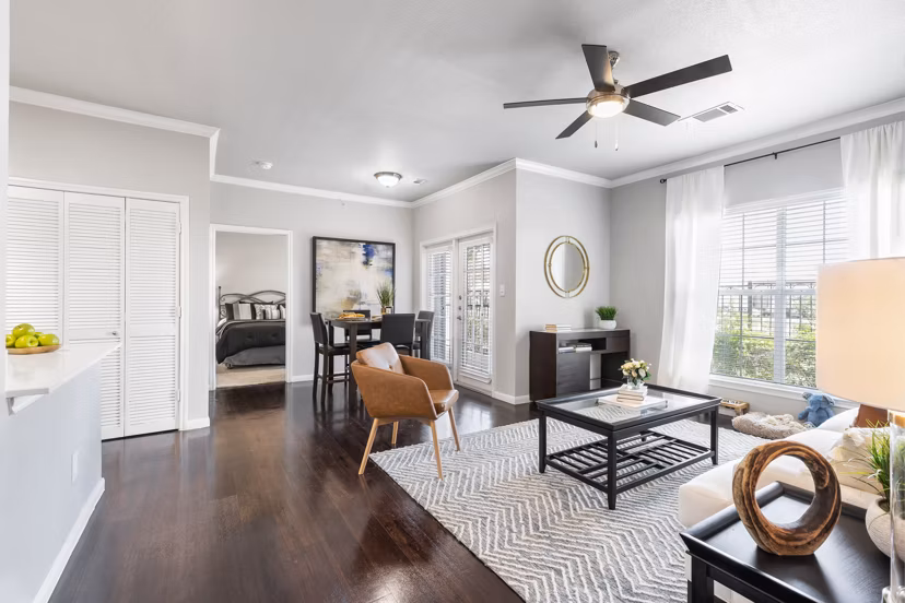 Spacious living room featuring modern furnishings at Villages at Turtle Rock Apartments