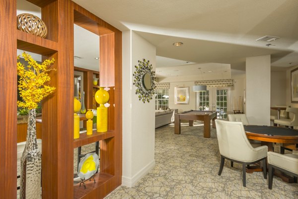 Clubhouse featuring modern lounge and meeting areas at Deerwood Apartments