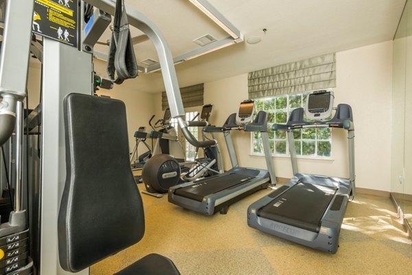 State-of-the-art fitness center at Deerwood Apartments featuring modern equipment and spacious workout areas