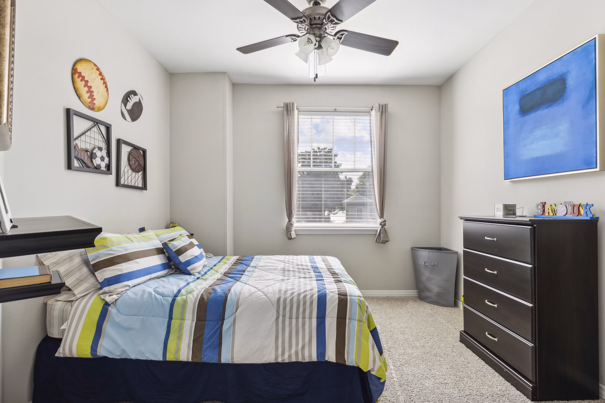 Modern bedroom featuring elegant furnishings at Towns of Chapel Hill Apartments