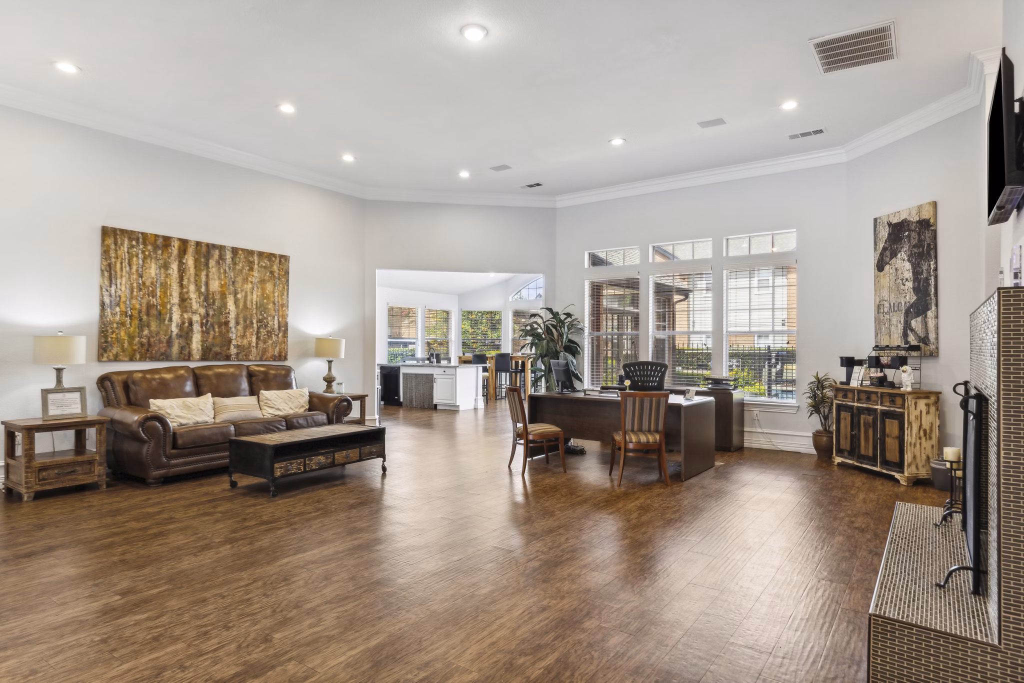 Clubhouse featuring modern lounge and entertainment spaces at Towns of Chapel Hill Apartments