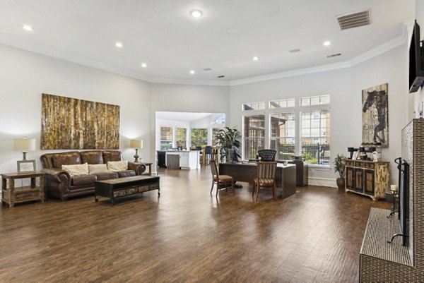 Clubhouse featuring modern lounge and entertainment spaces at Towns of Chapel Hill Apartments