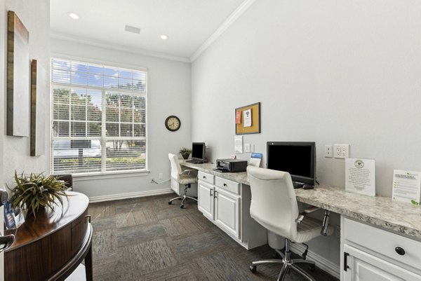 Clubhouse with modern decor and spacious seating at Towns of Chapel Hill Apartments