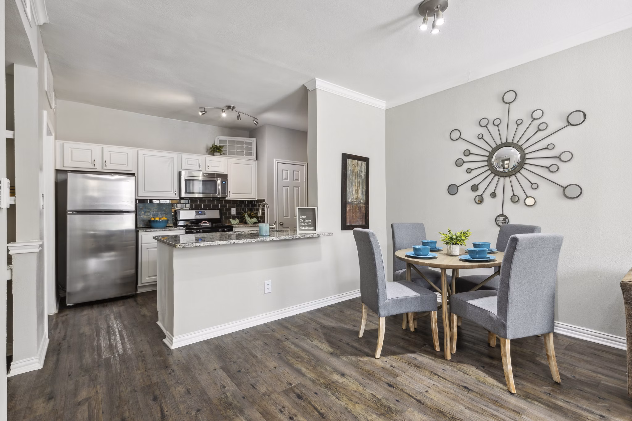 Clubhouse featuring spacious seating areas and modern design at Towns of Chapel Hill Apartments
