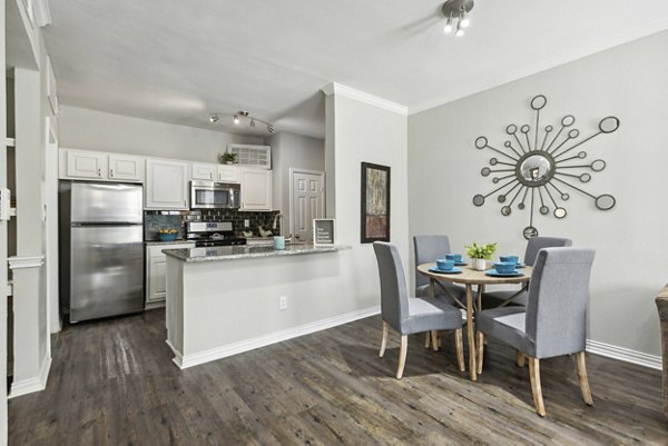 Clubhouse featuring spacious seating areas and modern design at Towns of Chapel Hill Apartments