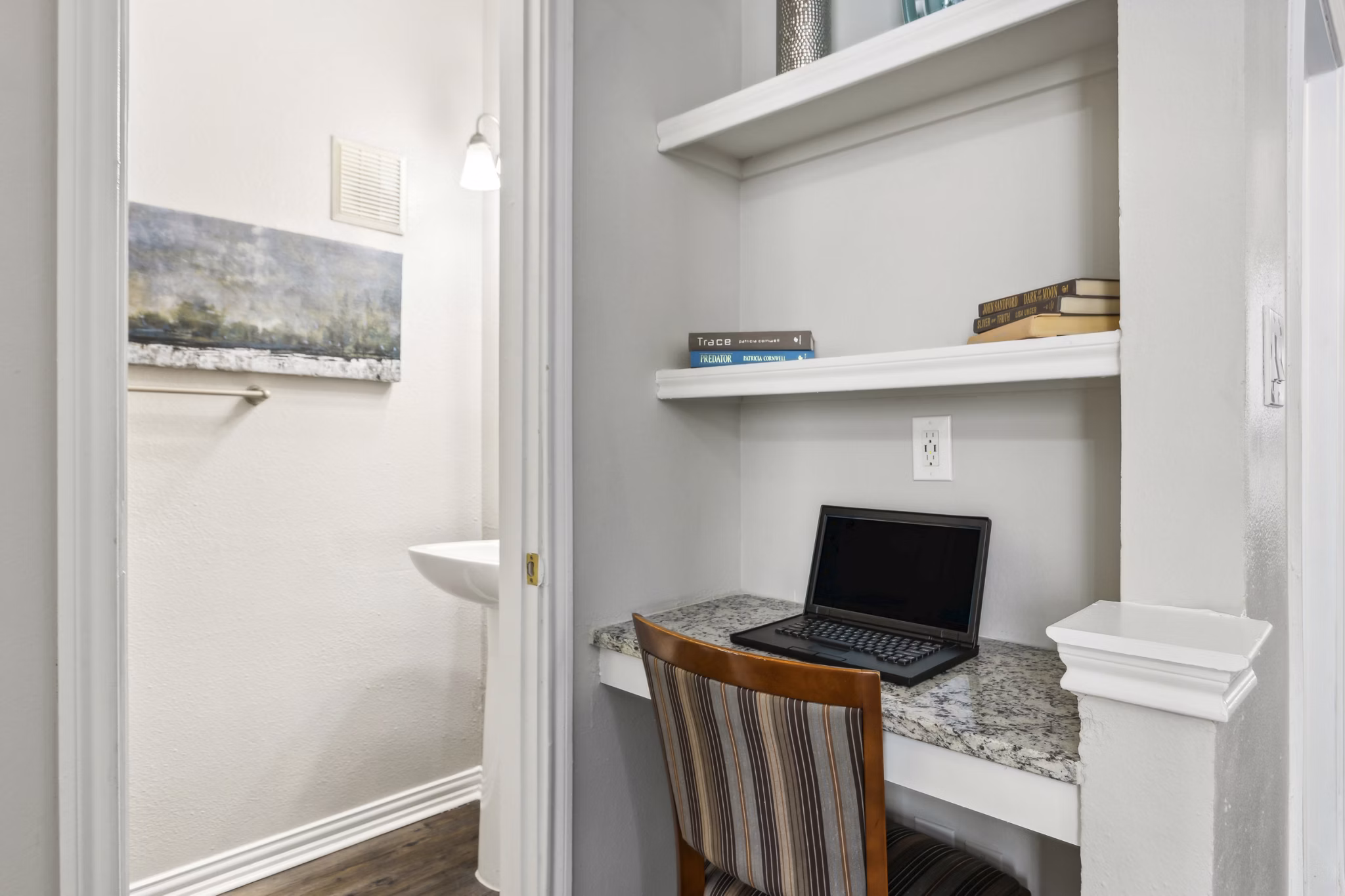 Spacious clubhouse with modern decor at Towns of Chapel Hill Apartments, ideal for social gatherings and community events